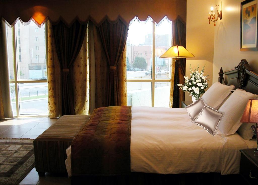 Milan Deluxe Suites Ель-Хубар Номер фото