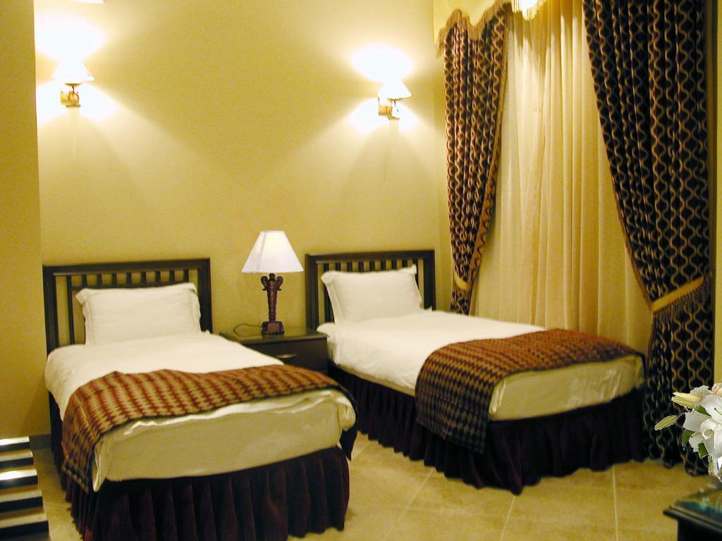 Milan Deluxe Suites Ель-Хубар Номер фото